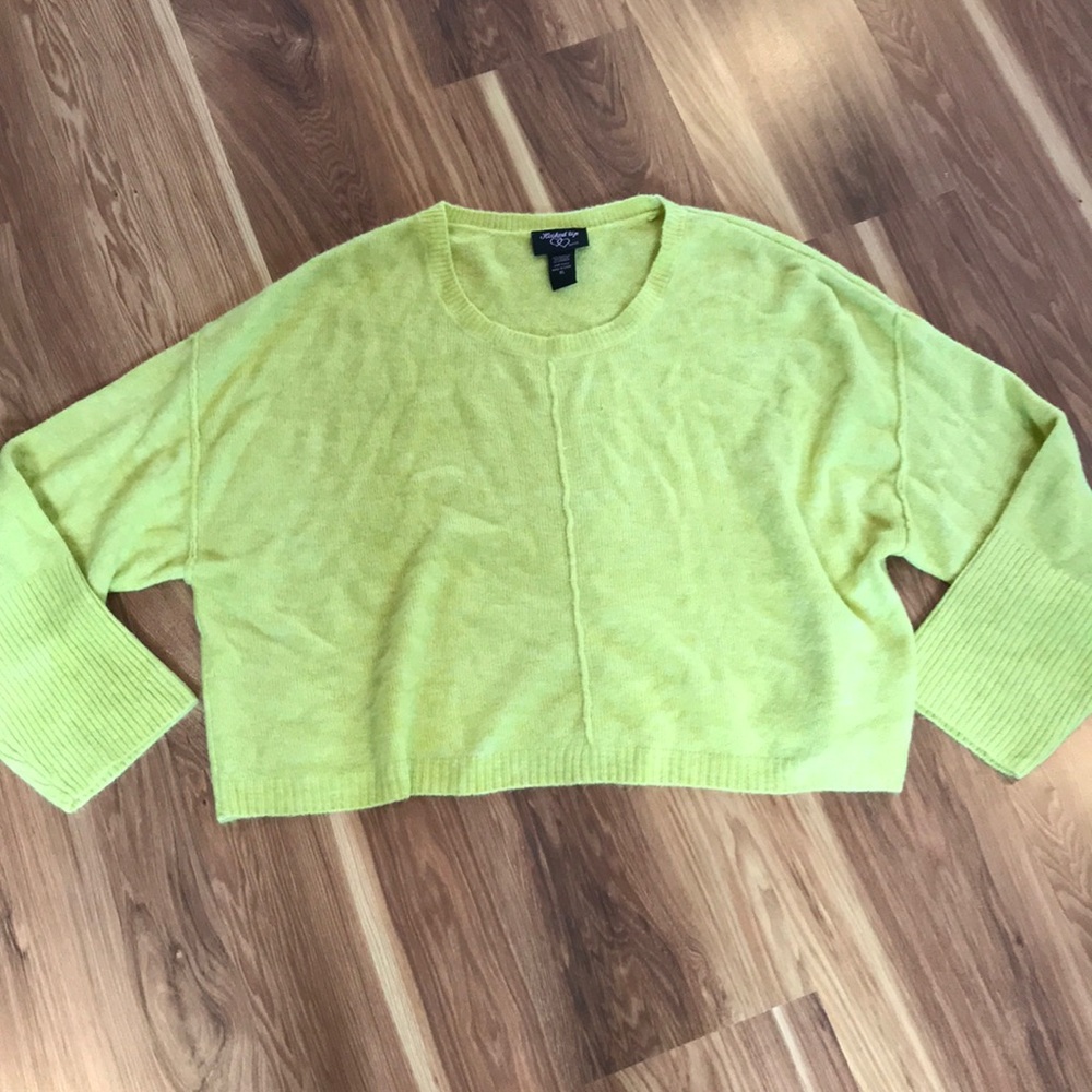 Bright yellow sweater